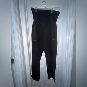 Black women’s maternity scrub pants. Figs brand.